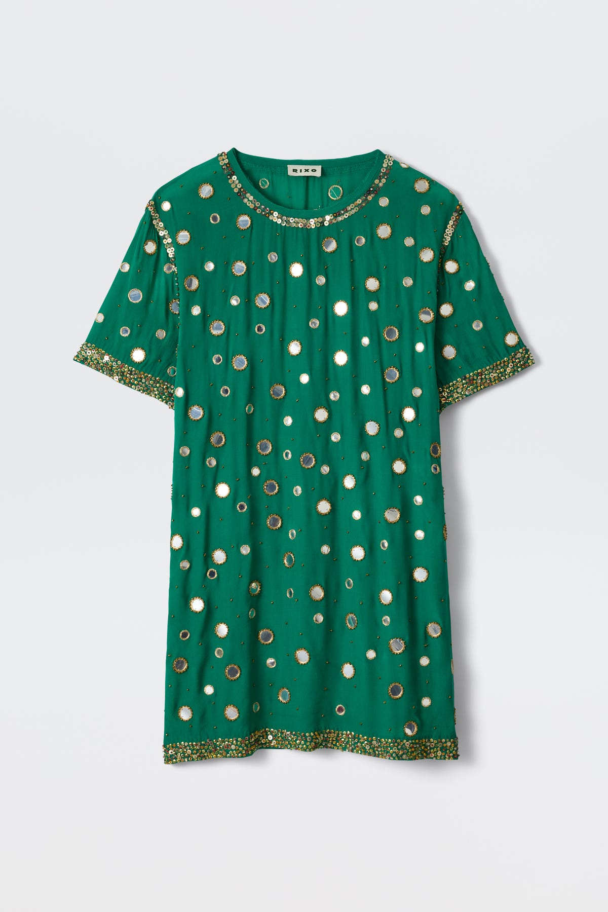 A dark green short-sleeve dress from Cruz, featuring gold and silver circular Lume embellishments and intricate gold beading along the neckline, sleeves, and hem.
