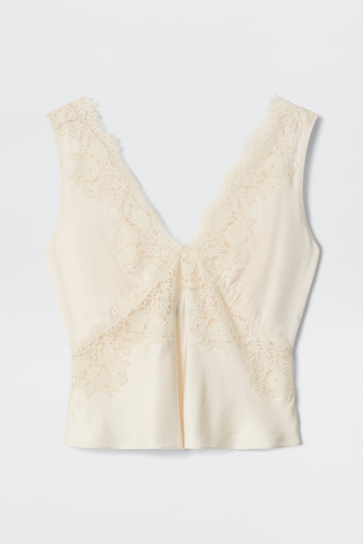 Emmie - Pearl: Cream-colored, sleeveless satin camisole featuring a deep V neckline and delicate lace trim on the front and shoulders, styled as an elegant separate and laid flat on a white background.