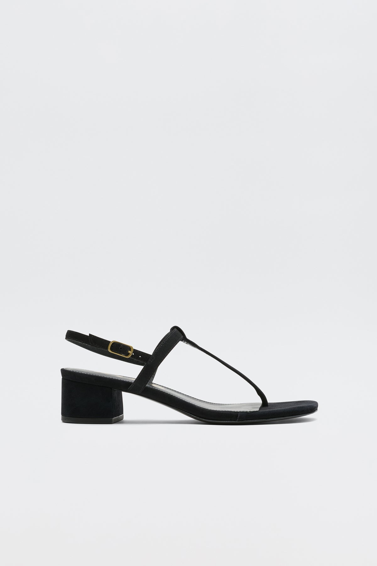 The Mads - Black sandal features a low block heel, thin straps, and a gold buckle—perfect for elevating your RIXO look. Shown on a plain white background.