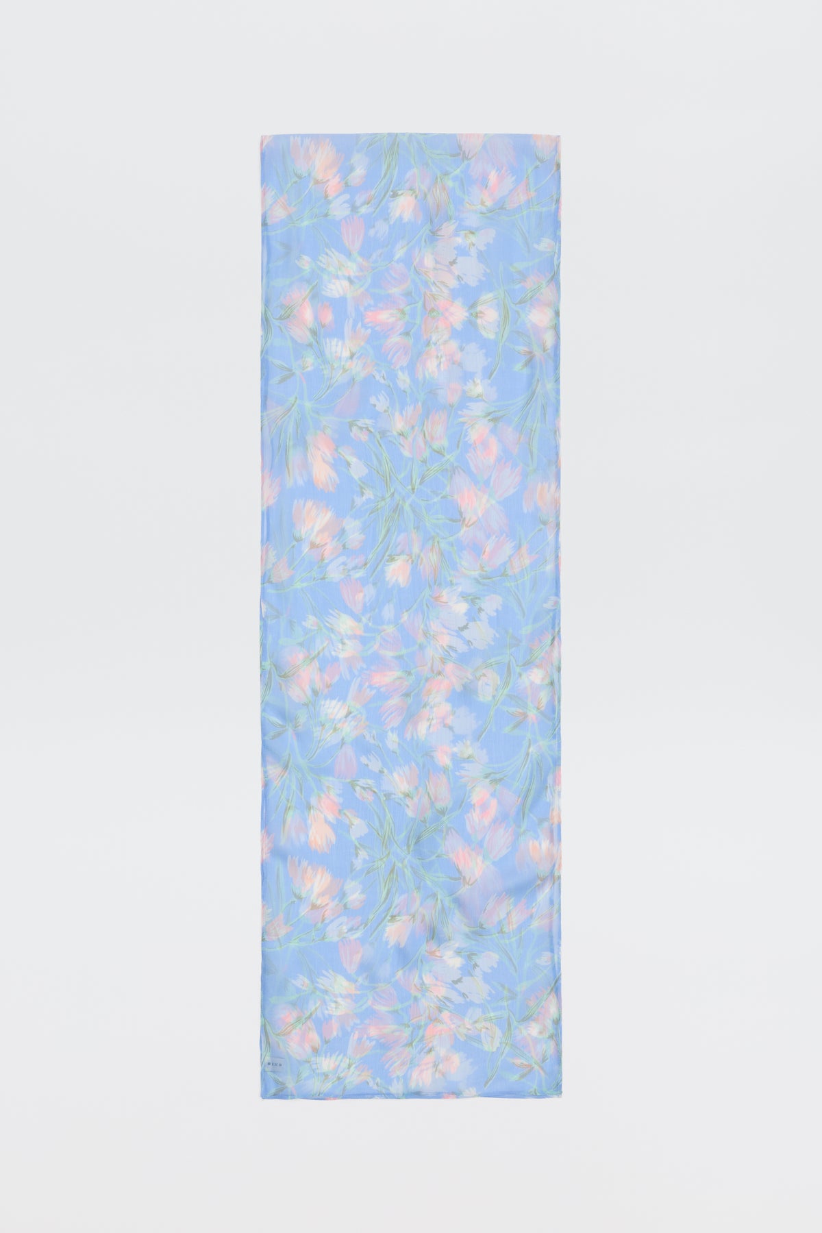 Julien - Watercolour Floral Blue: A rectangular fabric featuring a light blue background with pink and white floral patterns and green leaves, shown against a plain white backdrop.