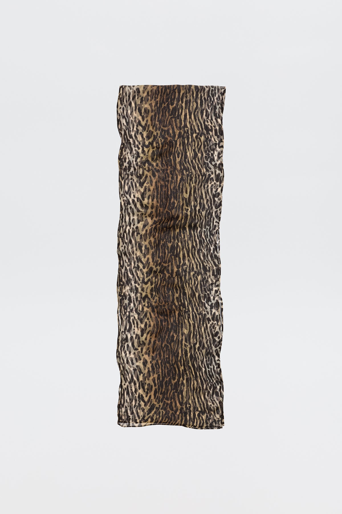 The Julien - Bohemia Leopard is a rectangular, crinkled scarf showcasing a bold brown and black leopard print on a plain white background.
