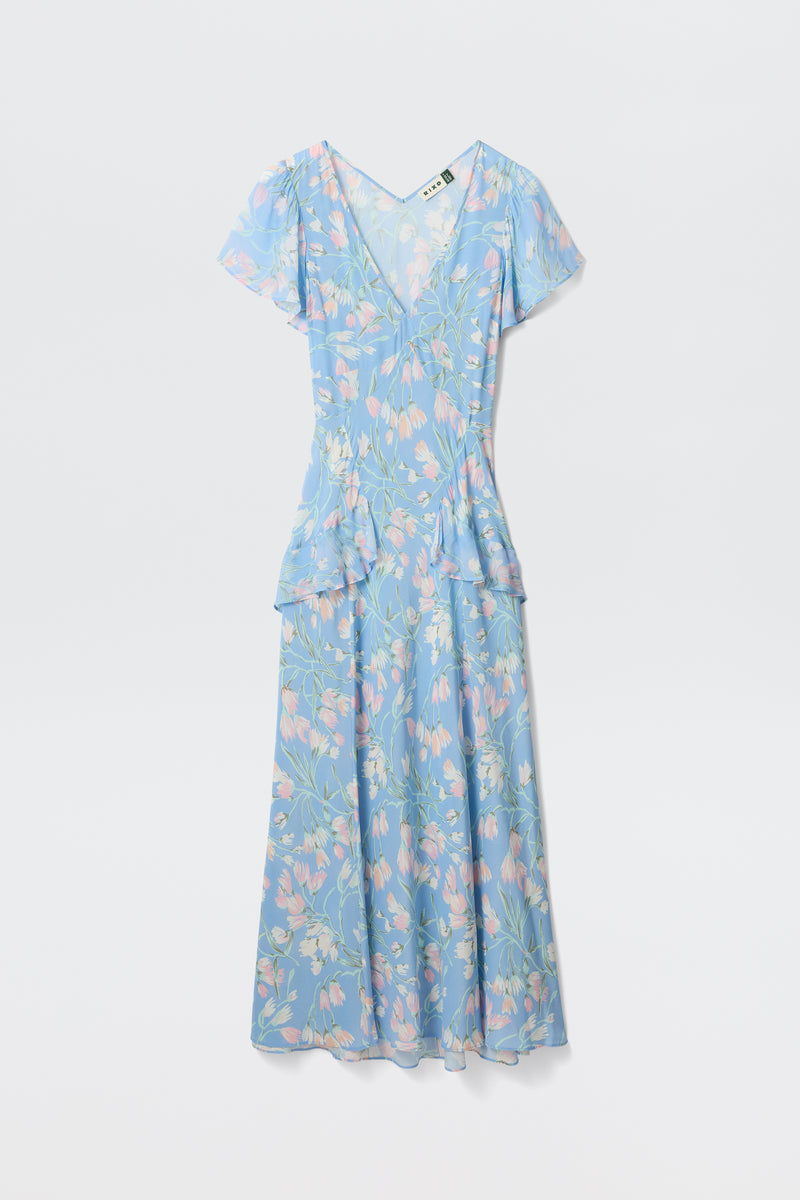 The Evie - Watercolour Floral Blue is a light blue, V-neck dress with short sleeves, a pastel floral print, ruffled hip detail, fitted waist, and an ankle-length flowing skirt.
