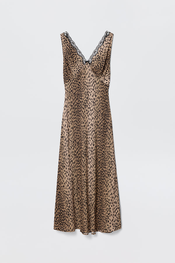 The Sandrine - Antelope Spot Black slip dress by RIXO is sleeveless with a V-neckline trimmed in black lace and features an antelope spot print, shown on a plain white background.