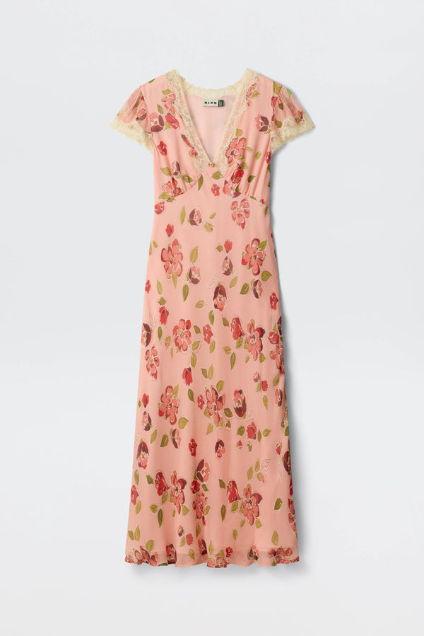 The Clarice - Kimmie Floral Pink dress features short sleeves, a floral pink print, a V-neckline, and lace trim on the sleeves and neckline, shown against a plain white background.