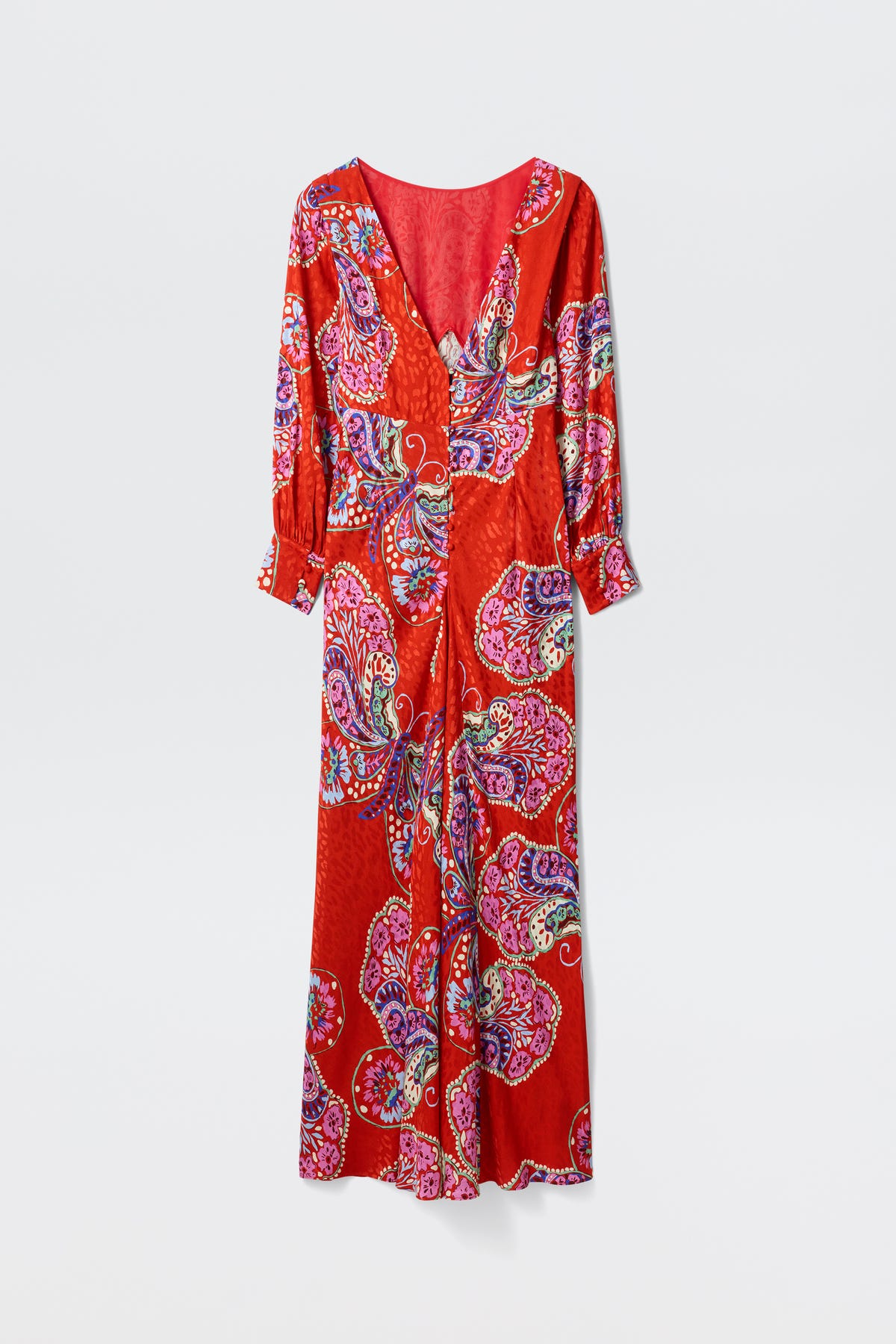 The Marni Butterfly Bloom Jacquard Red dress features a long, relaxed silhouette with a V-neckline, long sleeves, and a vibrant paisley pattern in pink, purple, blue, and white on red. Shown against a plain white background.