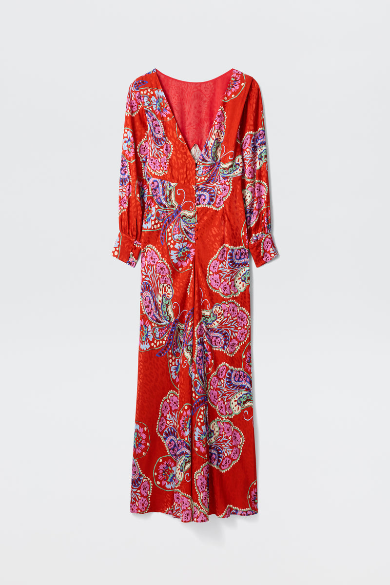 The Marni Butterfly Bloom Jacquard Red dress features a long, relaxed silhouette with a V-neckline, long sleeves, and a vibrant paisley pattern in pink, purple, blue, and white on red. Shown against a plain white background.