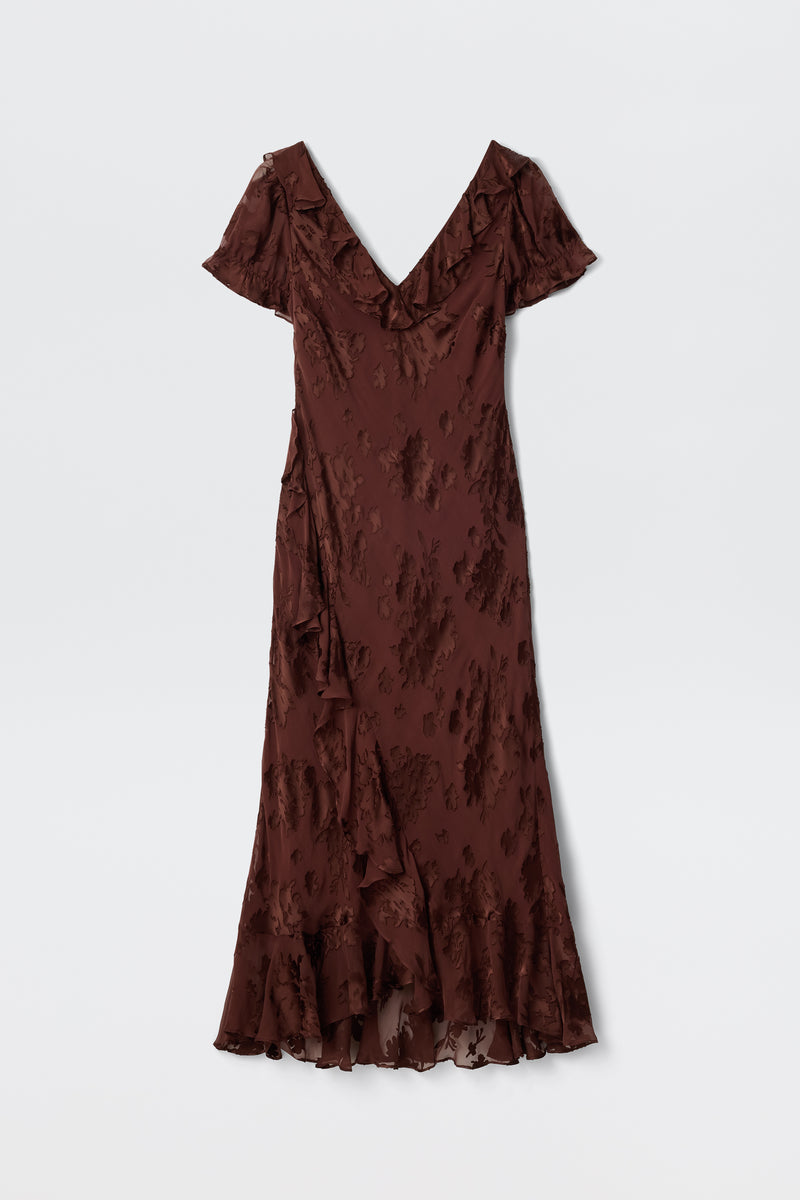 The Clementina - Bouquet Devoré Brown is a brown V-neck midi dress with short sleeves, a textured crinkled pattern, and a ruffled hem, displayed on a plain white background.