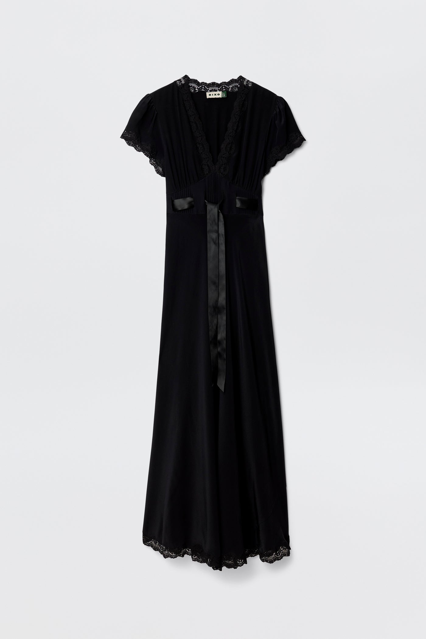 The Marlice - Black is a long black dress with short sleeves, lace trim on the neckline, sleeves, and hem, plus a satin bow sash at the waist—an elegant choice for your collection—shown against a plain white background.