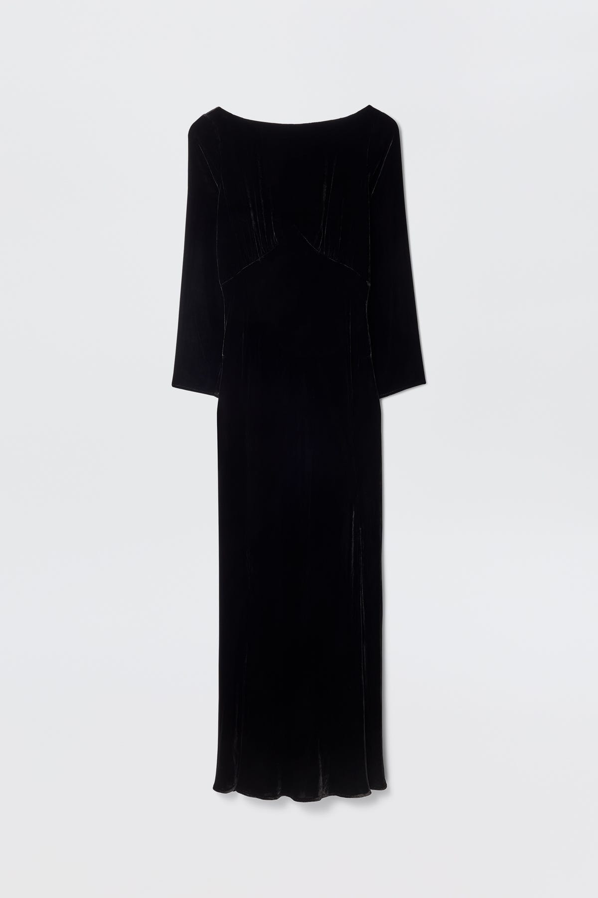 The Devina - Black is an elegant long-sleeved, floor-length black velvet gown with a high neckline and slightly fitted silhouette, shown against a plain white background.