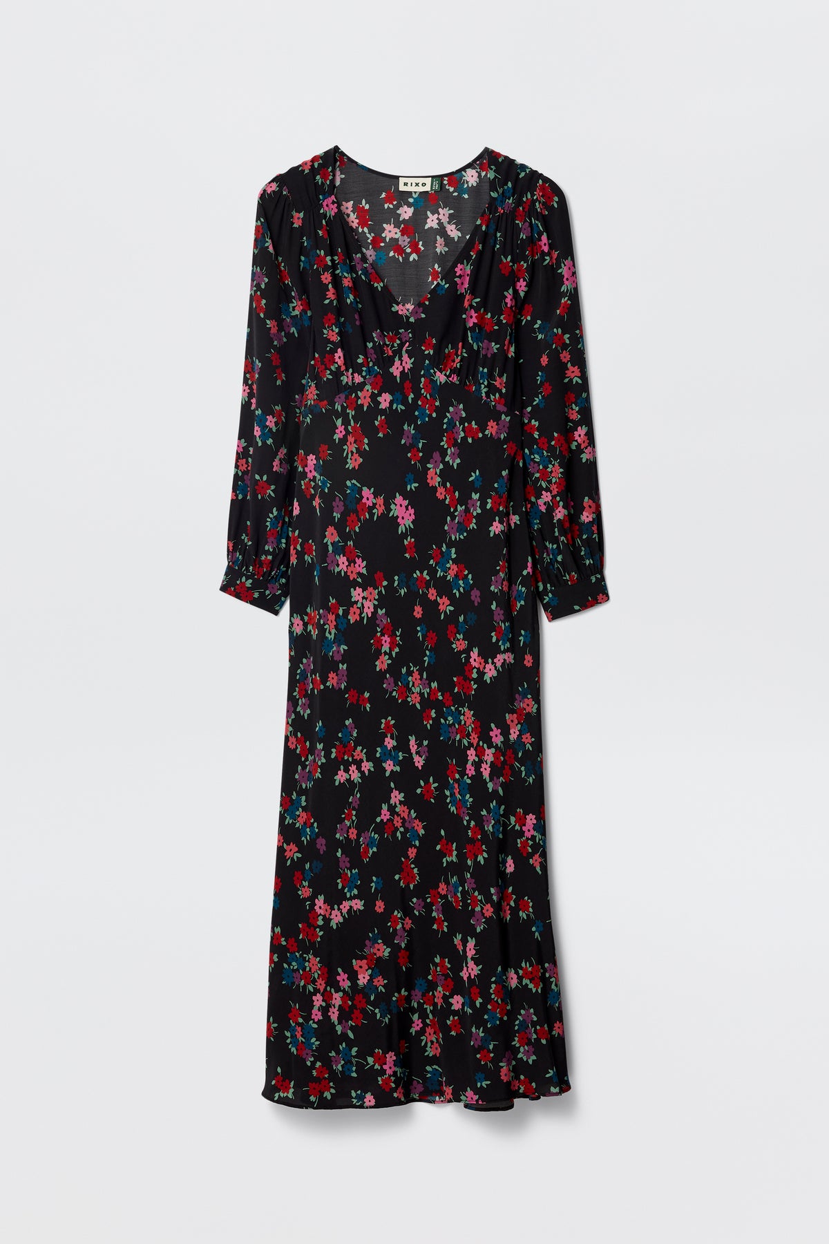 The Mavis - City Floral Black is a knee-length black silk Crepe de Chine dress with long sleeves and a vibrant floral print in red, pink, purple, and green—ideal for any occasion. Shown here against a plain white background.