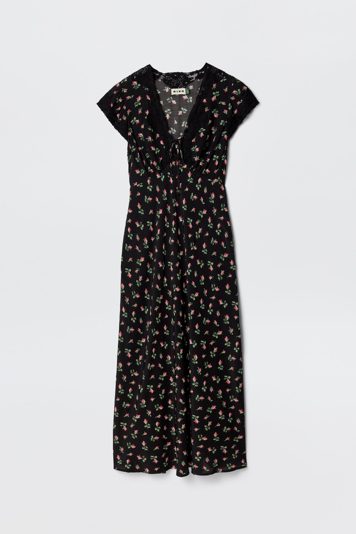 The Amari - Sienna Bud Black is a black bias-cut dress with short sleeves, a V-neckline, and a red and green Sienna Bud print. Its relaxed fit and lightweight fabric offer effortless elegance.