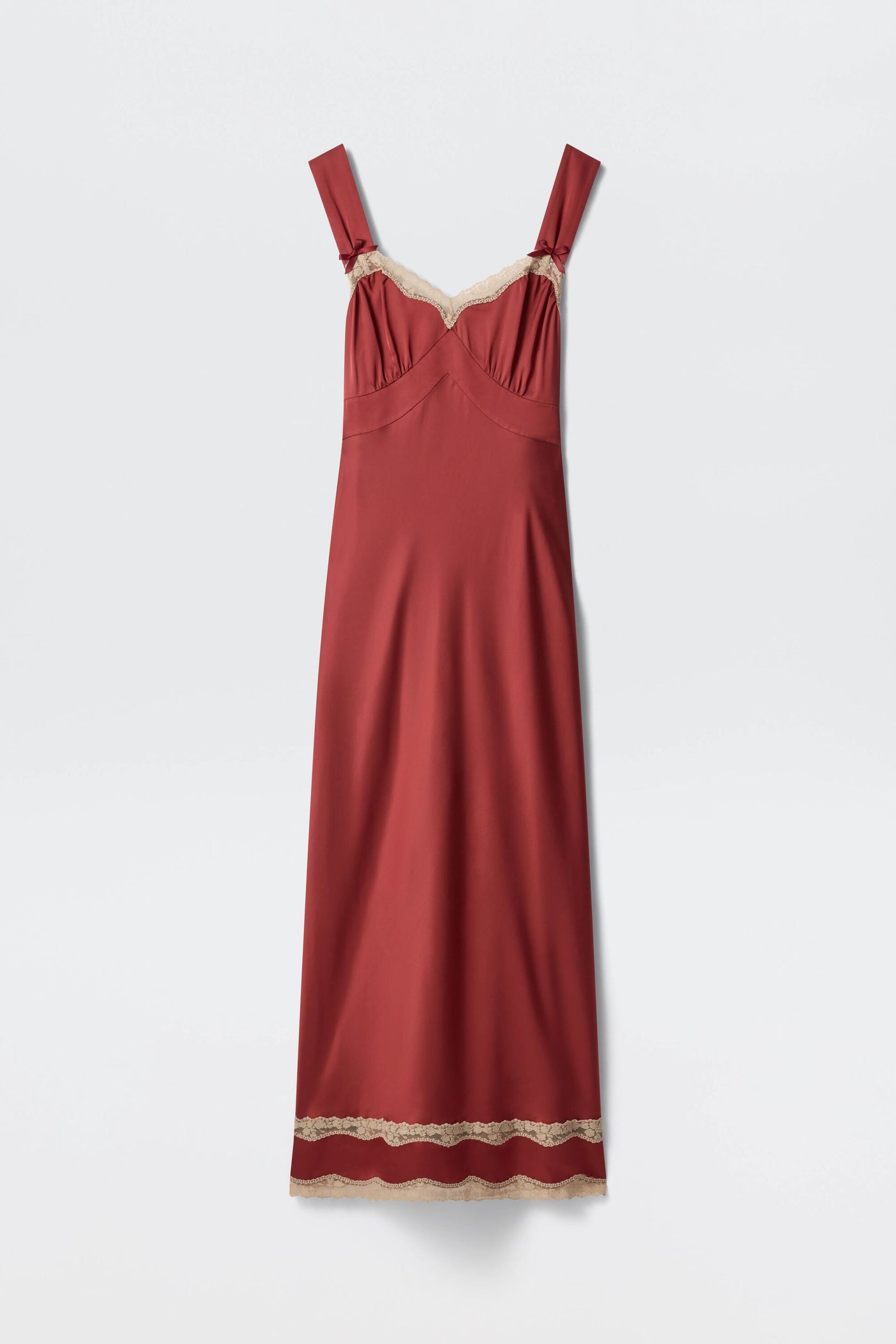 The Lucie - Rose is a sleeveless, ankle-length slip dress in deep red with beige lace trim on the neckline and hem, shown flat against a white background.