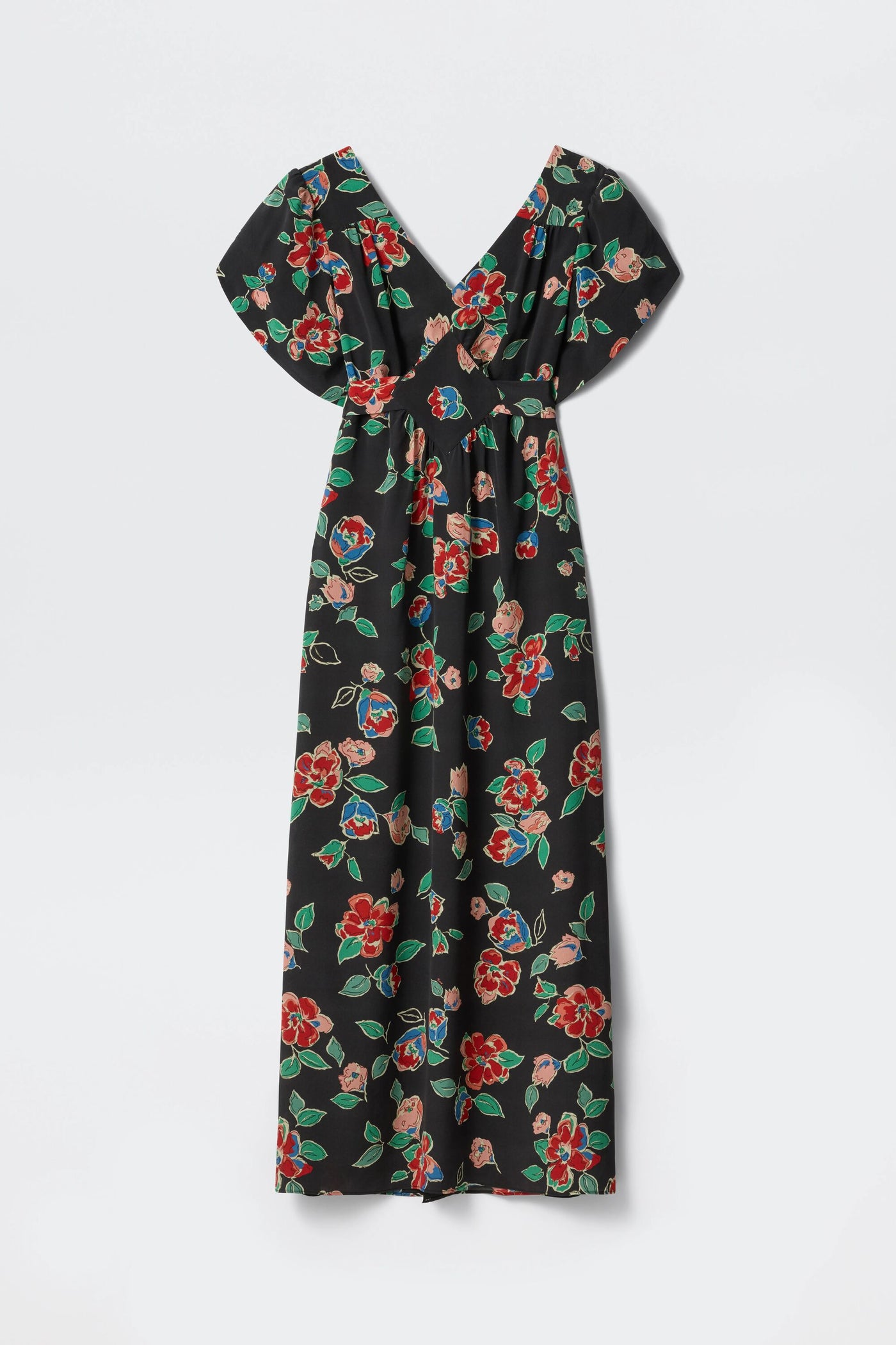 The Riella - Kimmie Floral Charcoal is a long black dress with short sleeves, a V-neck, and a fitted waist. It features a colorful floral print in red, pink, and green, and has a flowing skirt.