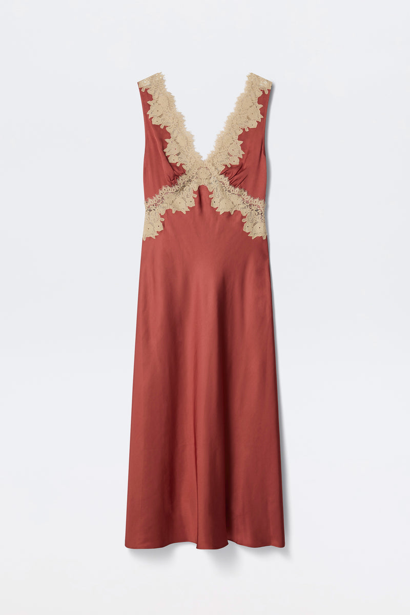 The Lysandra - Rose dress is a sleeveless rust-red satin piece featuring a deep V-neckline and cream lace trim along the neckline and waist, displayed on a plain white background.