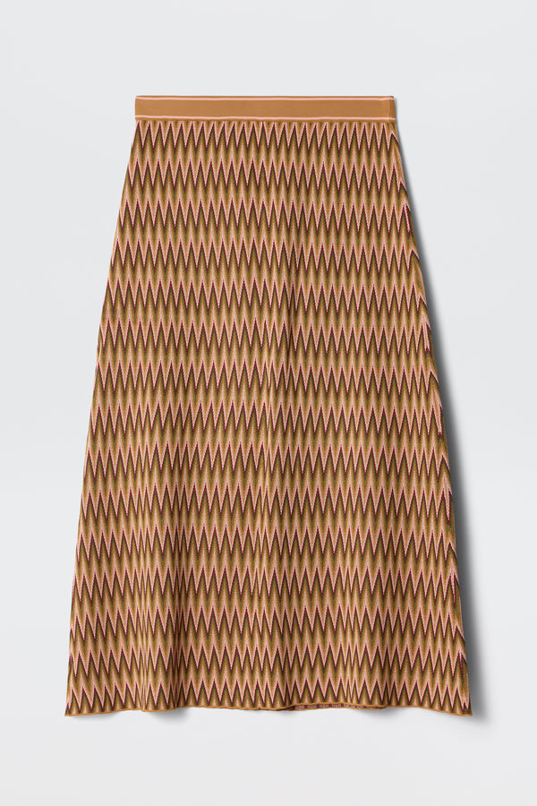 The Brandy - Maeve Jacquard Multi is a knee-length A-line skirt featuring a repeating zigzag pattern in brown, orange, and pink, displayed flat on a white background.