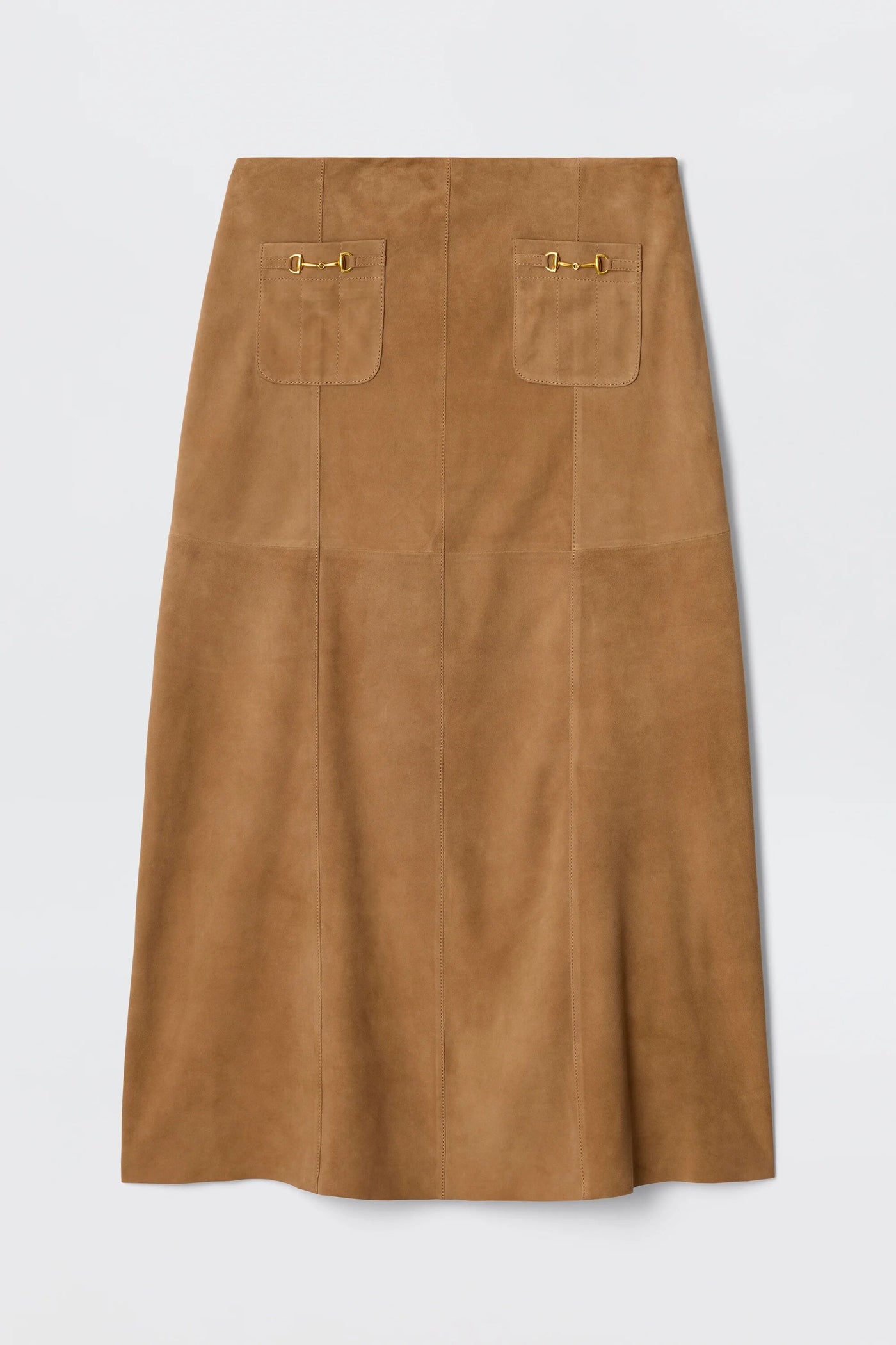The Edwina - Camel is a vintage-inspired tan suede skirt with a high-waisted A-line fit, two front patch pockets, and gold-tone bar details, shown against a plain white background.