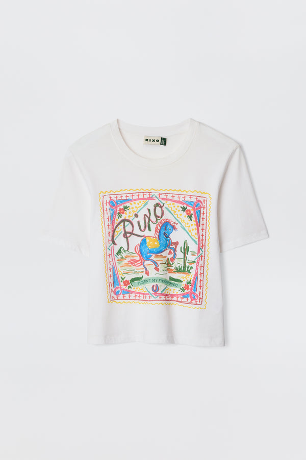 The Ria - Rider White T-shirt is a white cropped cotton-jersey top with a colorful front graphic featuring a blue horse, cacti, flowers, and "Rixo" in decorative script above the hem.