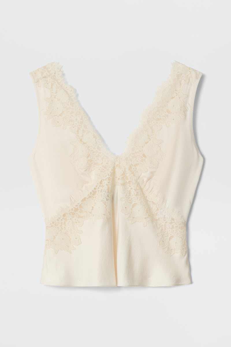 Emmie - Pearl: Cream-colored, sleeveless satin camisole featuring a deep V neckline and delicate lace trim on the front and shoulders, styled as an elegant separate and laid flat on a white background.