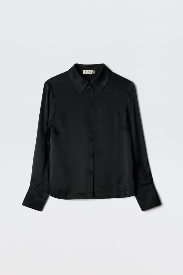 The Havan - Black is a silky, long-sleeve button-up shirt with a classic collar and wide cuffs, shown against a plain white background.
