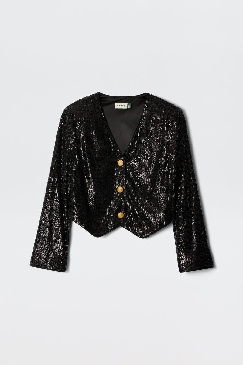 The Oliwia - Black stretch sequinned jacket is perfect for parties, featuring vintage gold buttons, a V-neckline, long sleeves, and a slightly cropped hem—shown against a plain light background.