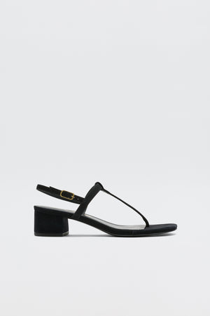 The Mads - Black sandal features a low block heel, thin straps, and a gold buckle—perfect for elevating your RIXO look. Shown on a plain white background.