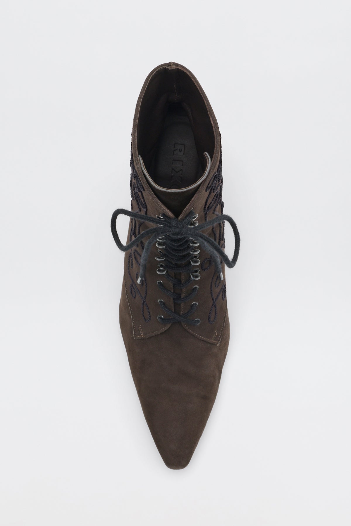 A top-down view of the Victoriana - Brown ankle boot, featuring brown leather, black embroidery, a lace-up front, and a pointed toe.