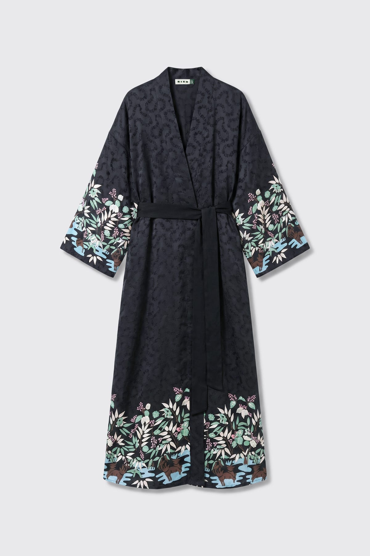 Introducing Kaiden - Blossom Jungle Black: a long black robe featuring a floral and animal pattern along the sleeves and hem, a matching waist tie, and a subtle textured design on the fabric.