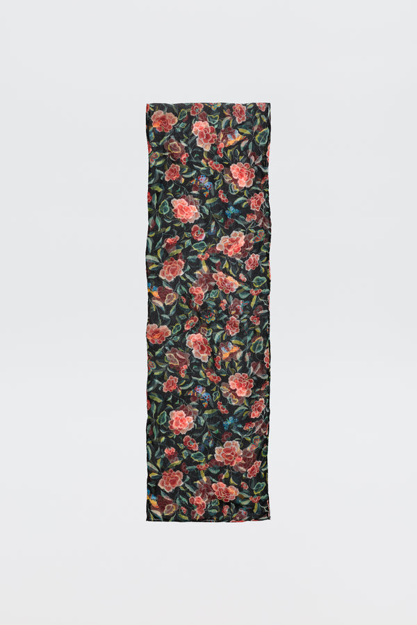 The Julien - Butterfly Floral Black scarf is rectangular and black, featuring a vibrant butterfly floral print with red and pink roses and green leaves, shown flat on a plain white background.