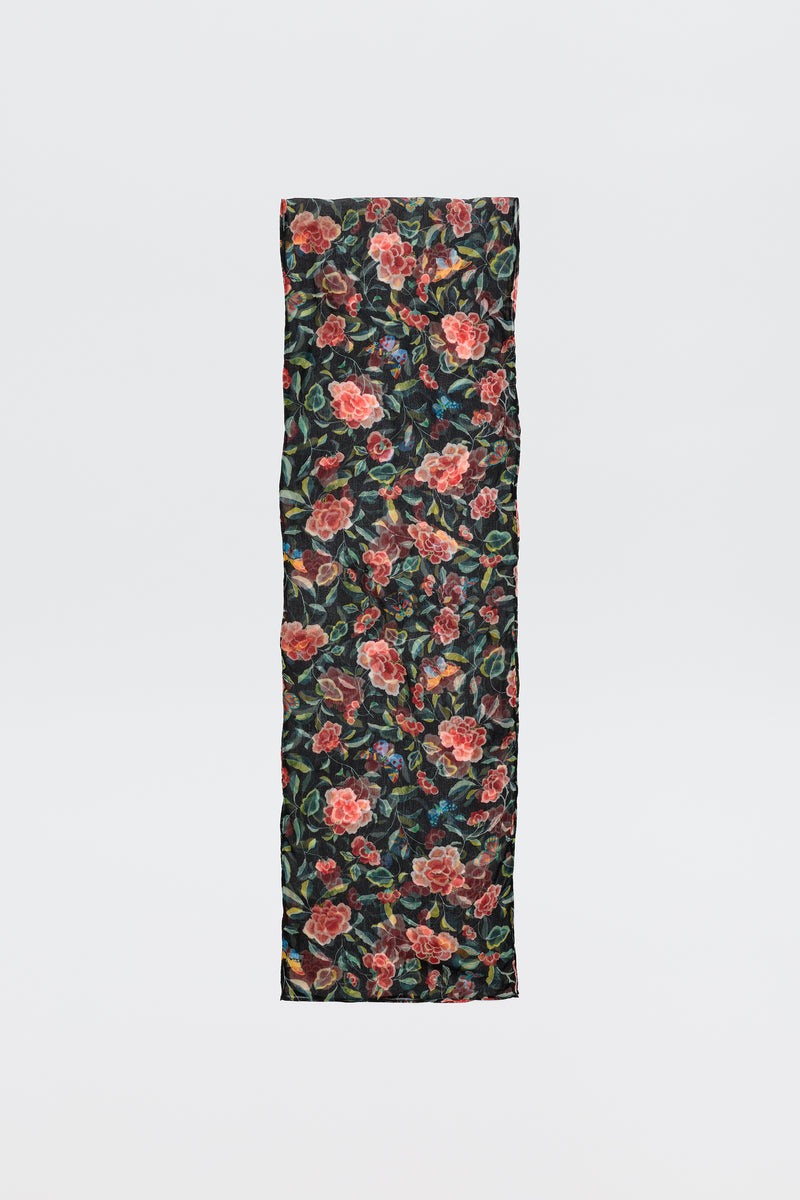 The Julien - Butterfly Floral Black scarf is rectangular and black, featuring a vibrant butterfly floral print with red and pink roses and green leaves, shown flat on a plain white background.