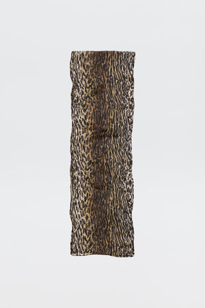 The Julien - Bohemia Leopard is a rectangular, crinkled scarf showcasing a bold brown and black leopard print on a plain white background.