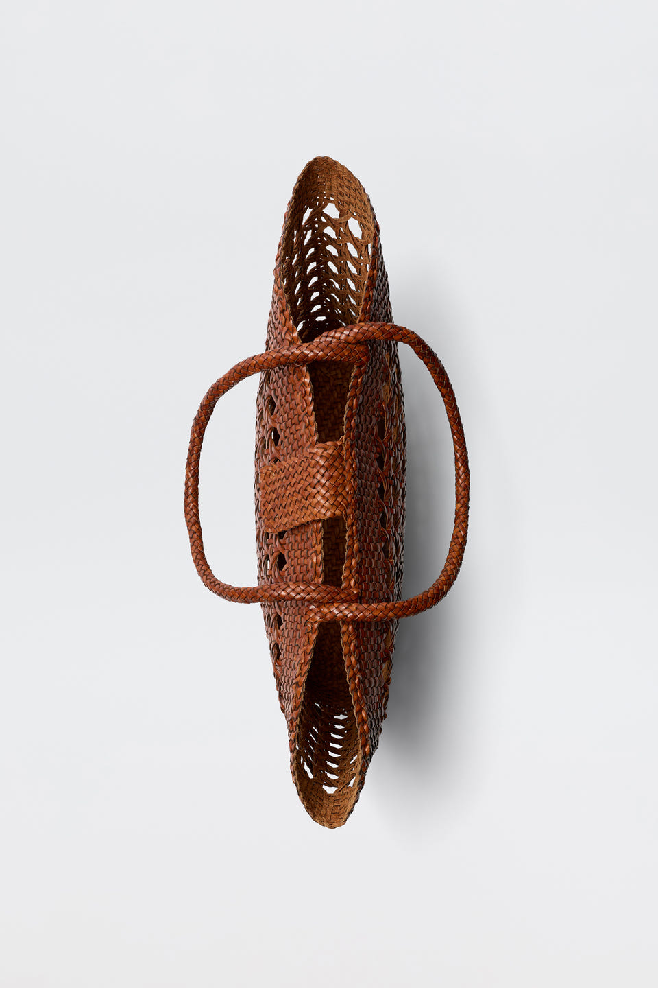 A top-down view of the Lucine - Tan, a brown woven leather handbag with two handles and an open, airy design, shown against a plain white background.
