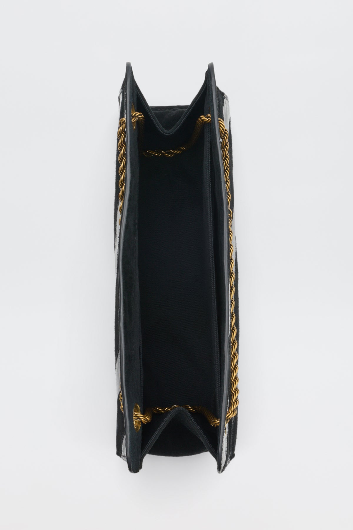 Top-down view of an open Eleina - Black handbag with gold chain straps.