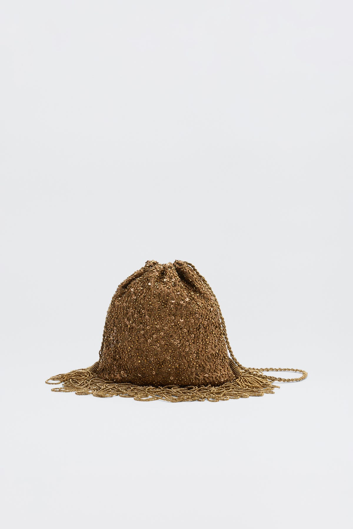 Orla - Vintage Scatter Embellishment Gold: a small gold beaded drawstring pouch with braided shoulder strap and decorative beaded fringe at the base, shown against a plain white background.