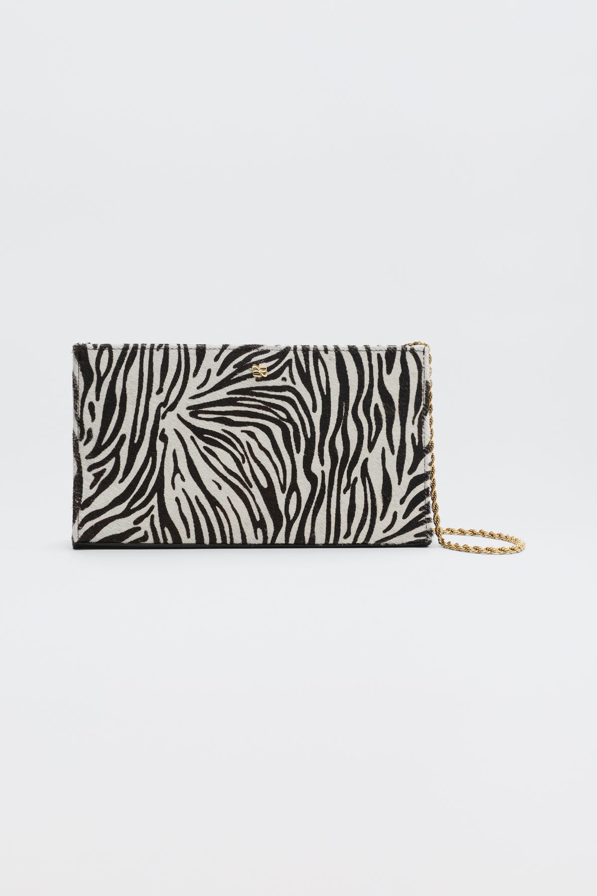 Kamila - Zebra Print Brown rectangular clutch bag with a brown and cream zebra print and a gold-tone chain strap.