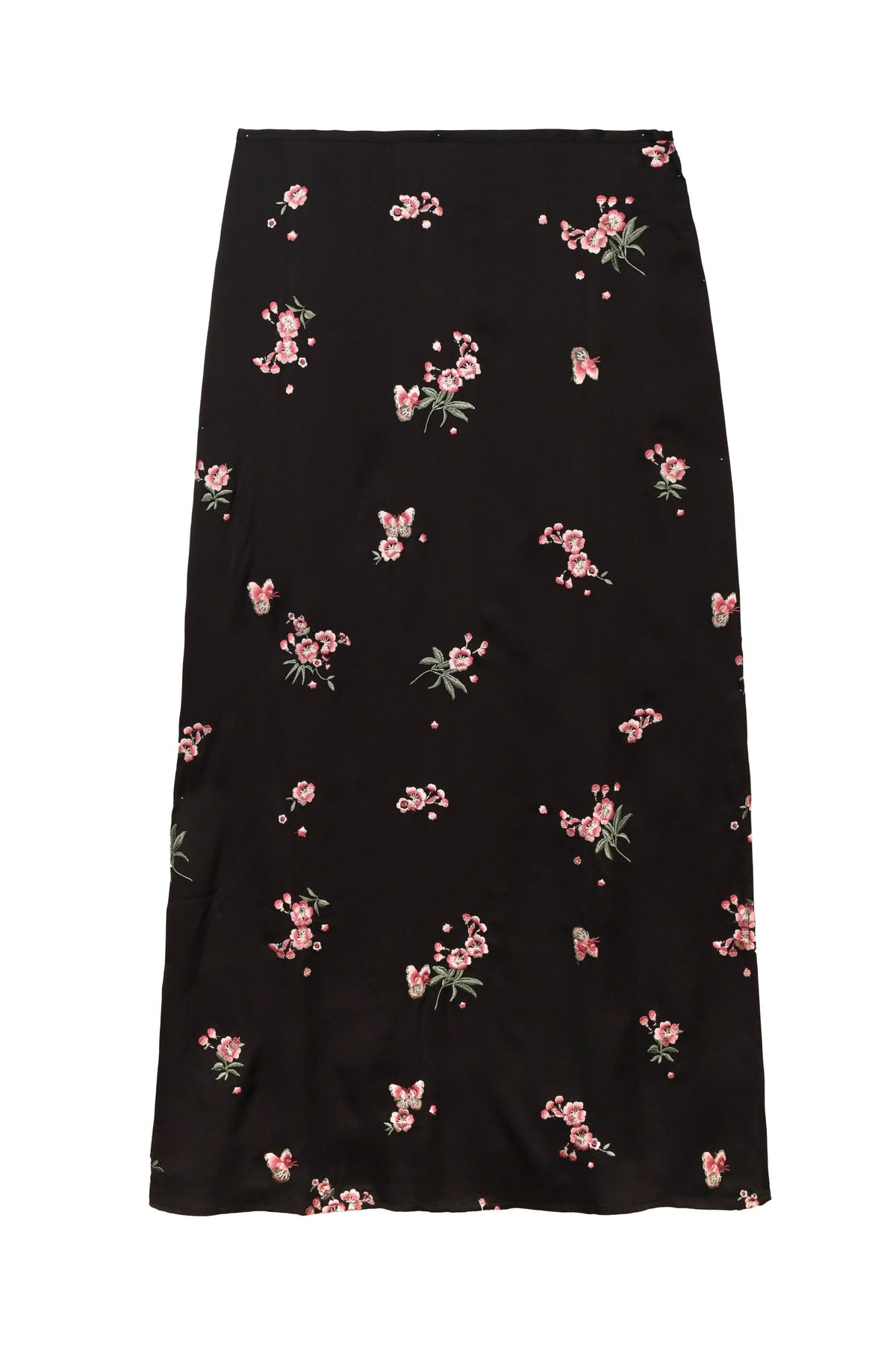 The Indiya - Blossom Embroidery Pink skirt features a long, black column silhouette with straight cut and scattered pink floral embroidery. Available in regular and petite sizes.