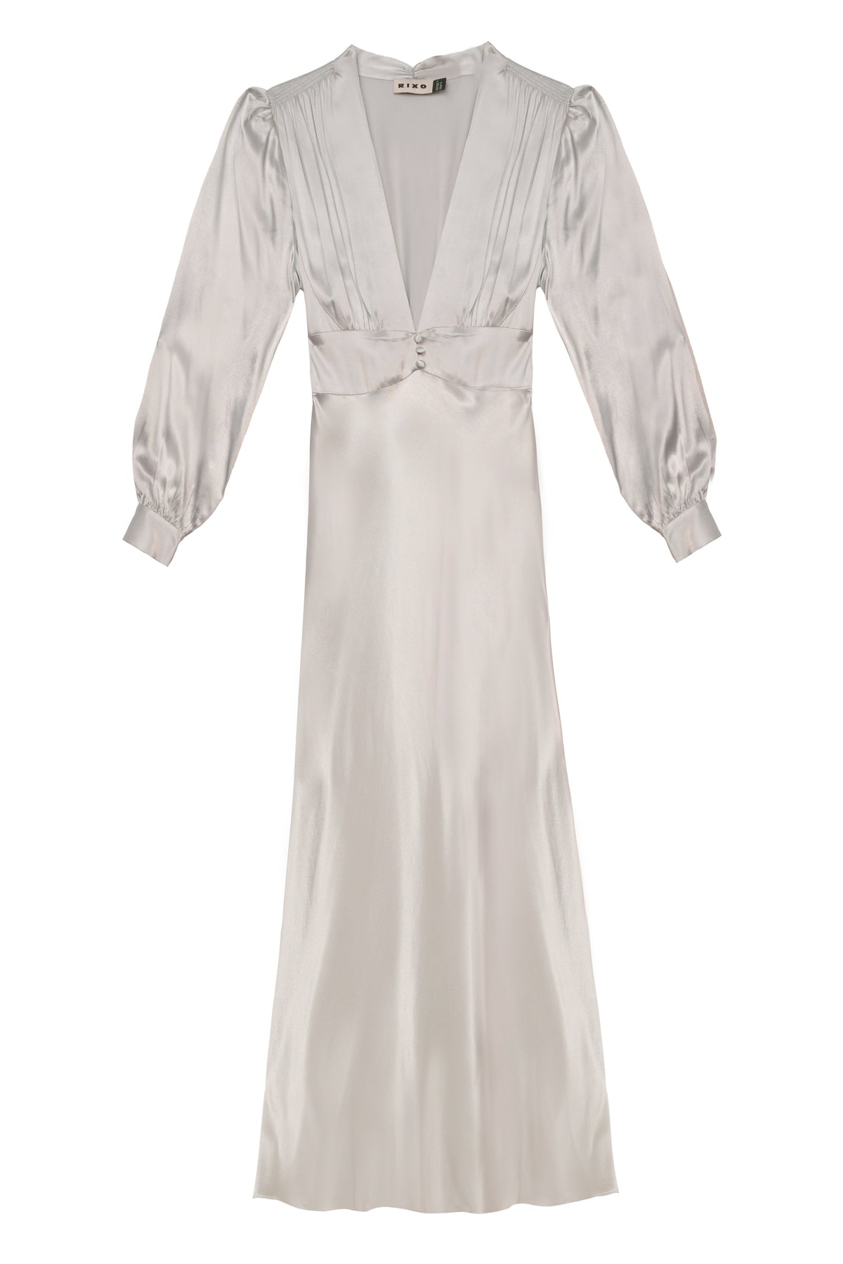 The emory - silver is a long, elegant satin dress in silver with a deep V-neck, pleated bodice, voluminous shoulders, puffed sleeves with cuffs, and a nipped-in waistband, shown on a white background.