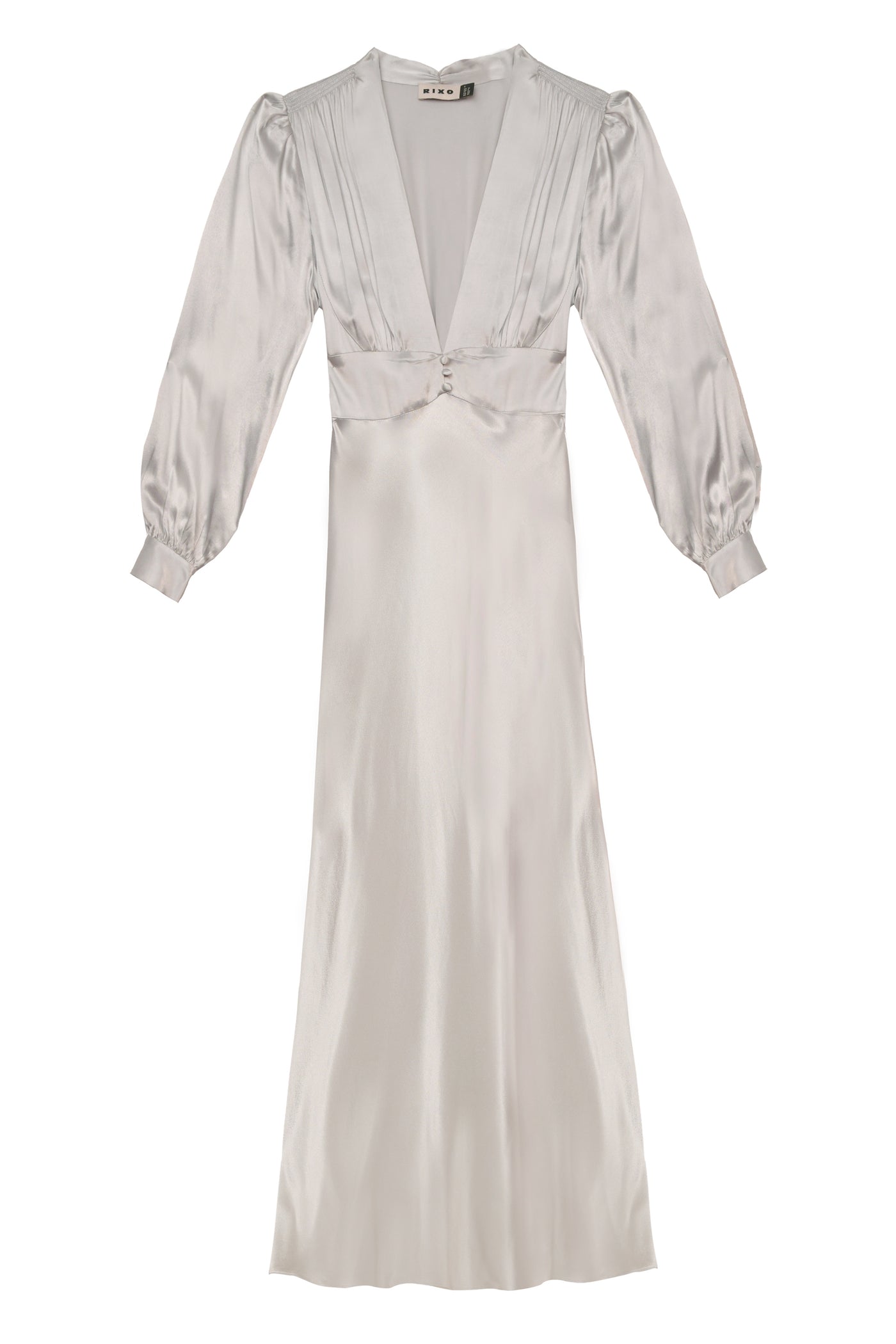 The emory - silver is a long, elegant satin dress in silver with a deep V-neck, pleated bodice, voluminous shoulders, puffed sleeves with cuffs, and a nipped-in waistband, shown on a white background.