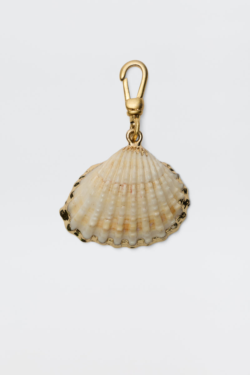 Shell - White is a gold keychain featuring a natural scallop seashell, partially framed with gold-plated metal and attached to a gold lobster clasp, offering vintage-inspired elegance against a plain white background.