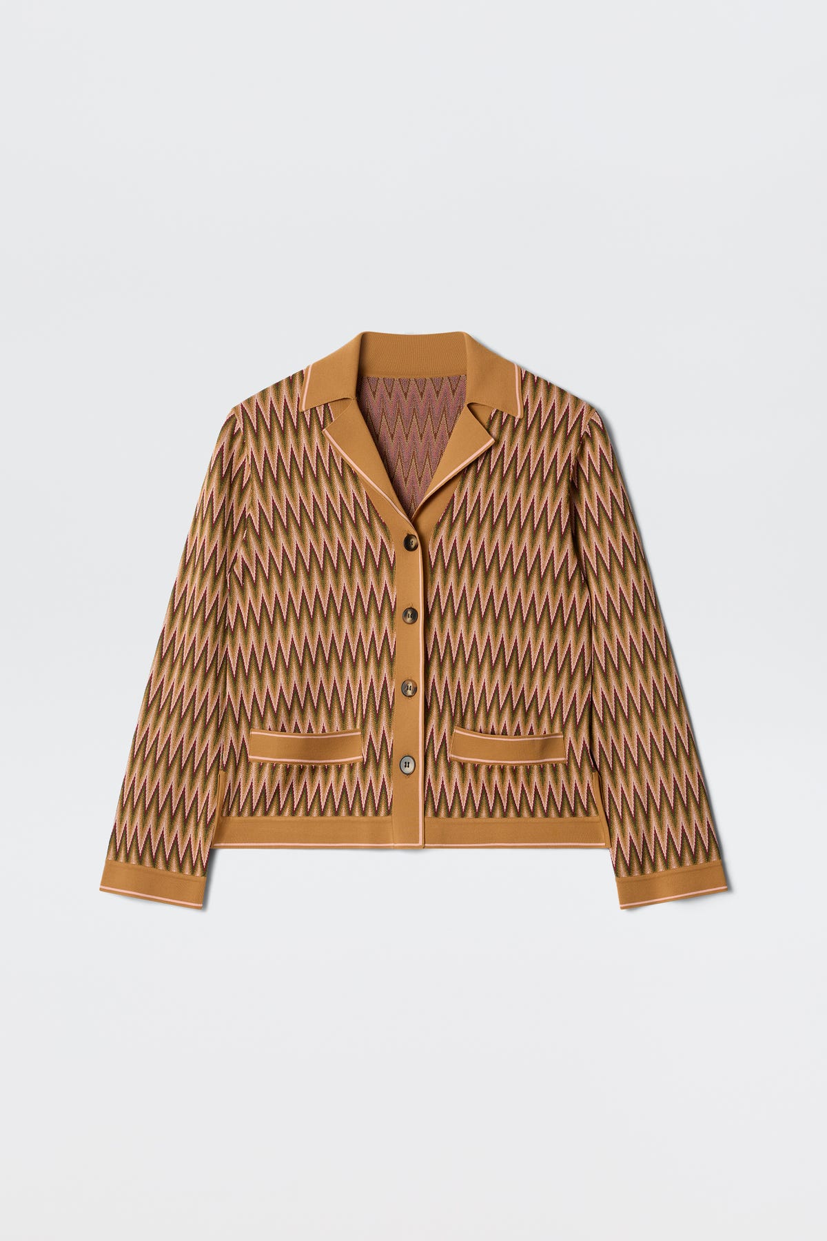 The Quinley Maeve Jacquard Multi is a brown long-sleeve jacket with beige and mauve zigzag patterns, a collar, button-up front, and two front pockets, shown laid flat on a white background.