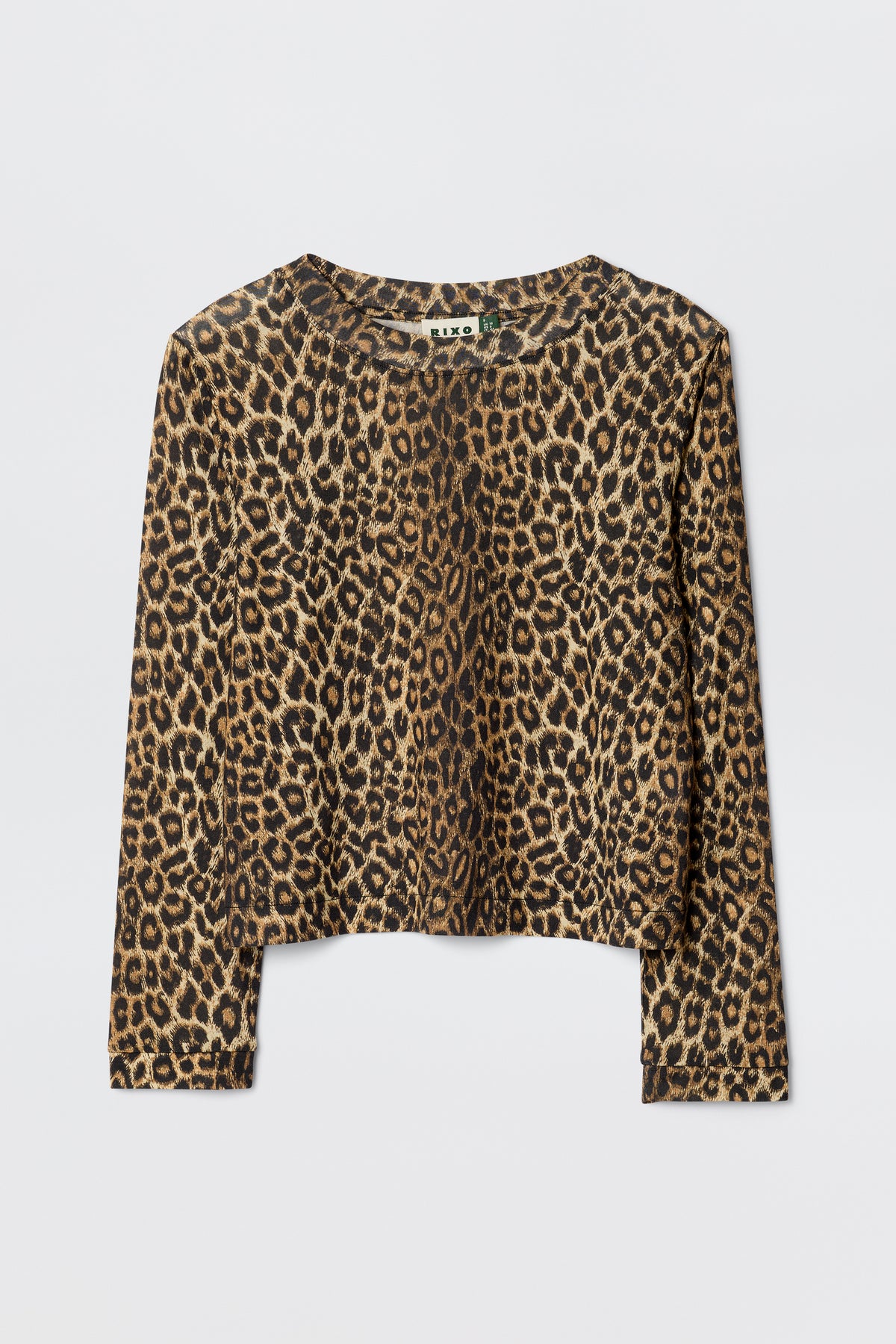 The Phaedra Lyra Leopard Black is a long-sleeve cropped top in soft Tencel Jersey, showcasing a bold brown and black leopard print on a plain white background.