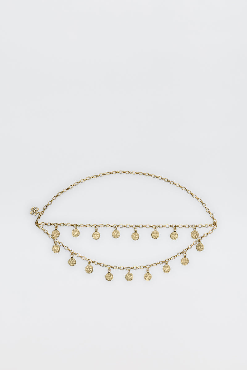 The Lita - Gold is a two-row chain belt featuring evenly spaced small round coin charms, shown against a plain white background.