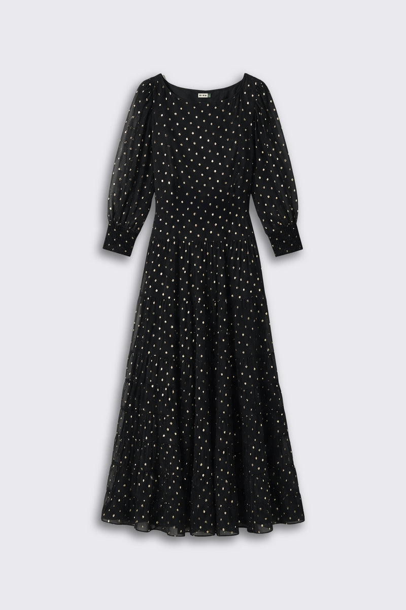 Lucina - Gold Spot Black midi dress with sheer sleeves and a gold polka dot pattern.
