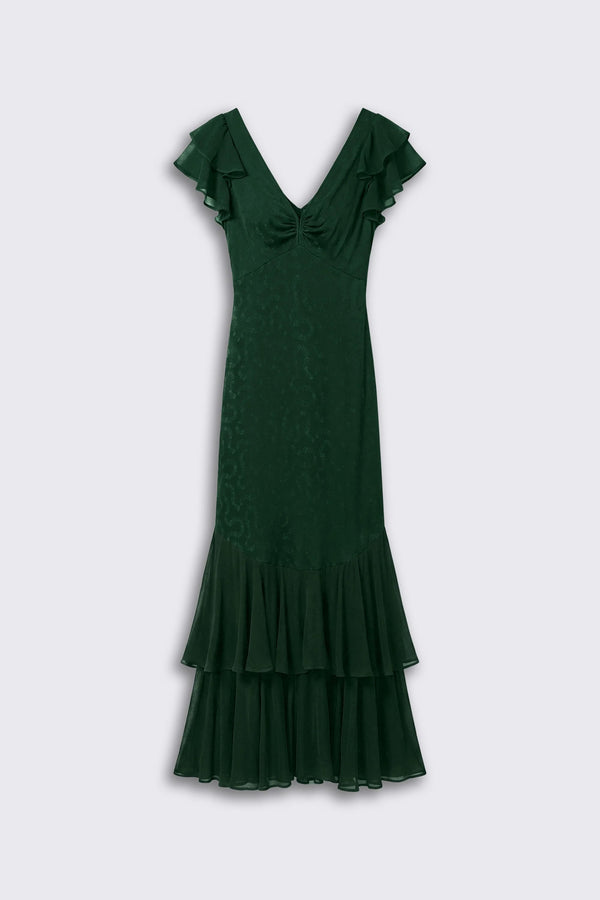 Marlow - Floral Trail Jacquard Dark Green: A short-sleeved dress in dark green jacquard with ruffled sleeves and hem, featuring a V-neckline and fitted bodice, displayed on a plain light grey background.