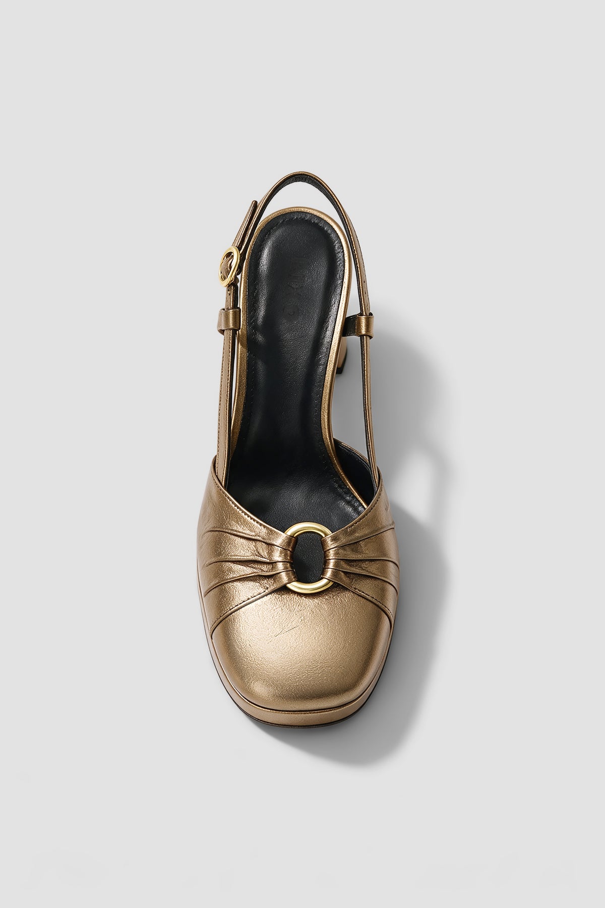 Moreen - Dark Gold slingback heel featuring a round buckle detail at the toe.