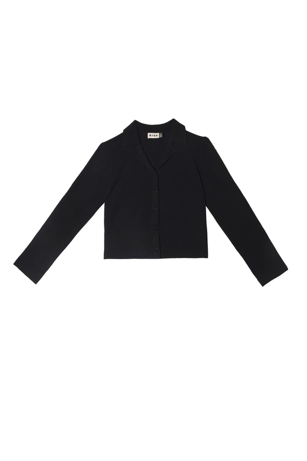 The Carla - Black is a long-sleeved, black cropped blazer made from a luxurious wool-cashmere blend, featuring a collar and front buttons, shown against a plain white background.