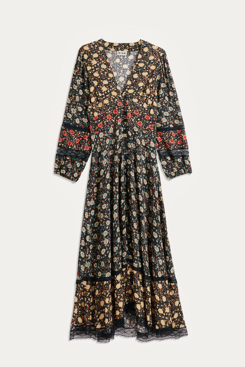 The Raven - Eva Floral Mix Black is a RIXO signature V-neck maxi dress with long sleeves, featuring a yellow, red, and white floral print on black and delicate lace trim at the hem and cuffs.