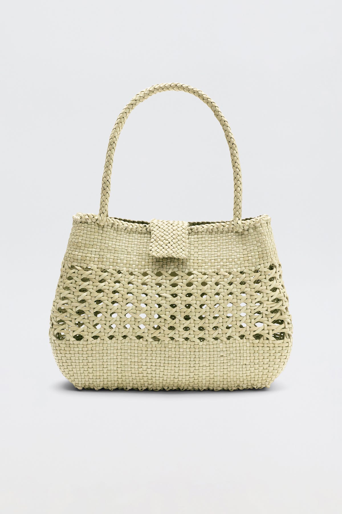 Niamh - Butter is a beige woven handbag inspired by vintage styles, featuring a braided top handle and a textured pattern, displayed against a plain light background.